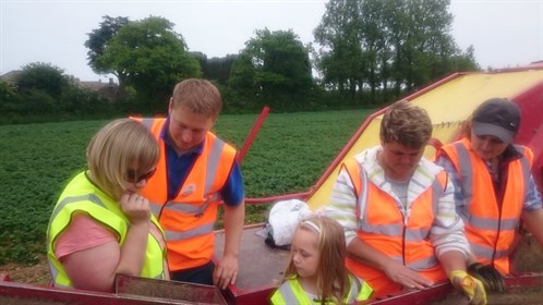 visitors took the opportunity to ride on the back of a harvester