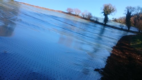 plastic covered field